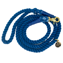 Load image into Gallery viewer, The image shown is of the Dogs Rope Leash in Dark Blue colour. The rope leash has gold metal hardware finishes and has Woof First imprinted on a round charm.