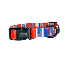 Load image into Gallery viewer, Showcasing Red,, Blue and white stripped pattern Dog Collar with metal D ring in black colour from Woof First