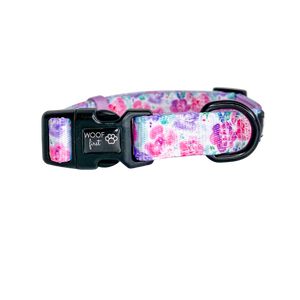 Showcaing Pink and Purple flowers and greenn leaf pattern Dog Collar with metal D ring in black colour from Woof First