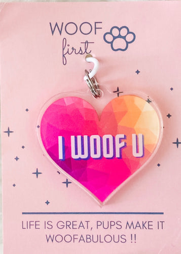 Dog Collar Charm or Pet Tag in Heart Shape with I WOOF U written on it. Heart is of multi colour pink yellow purple